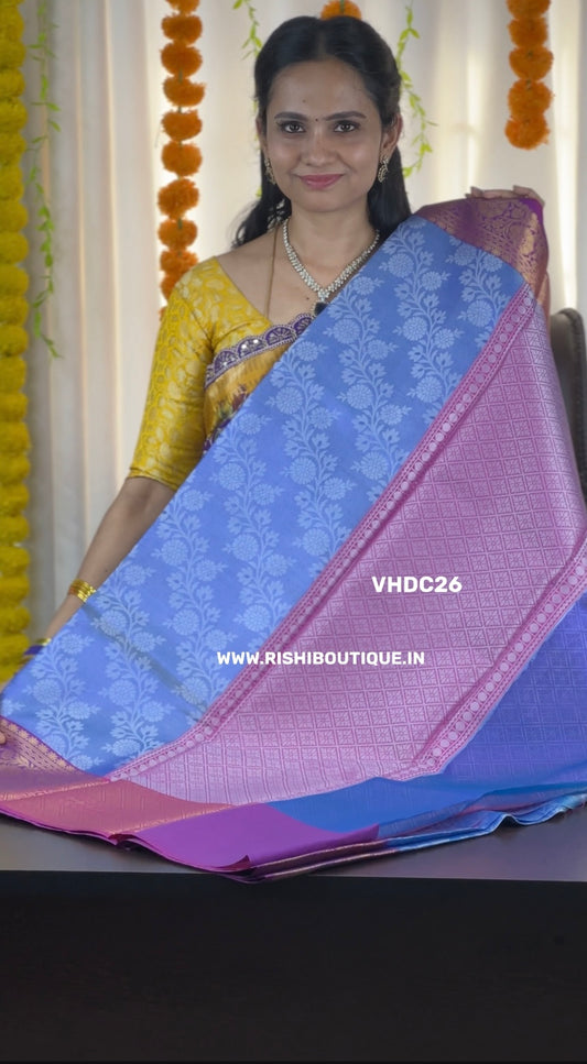 Katan plus warm silk saree.