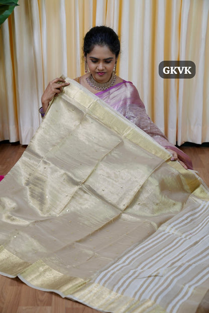 Tissue silk gold colour saree with embroidery & sequence work butti with zari weaving border & chit weaving pallu
Blouse - Contrast embroidery & sequence work blouse🥳.