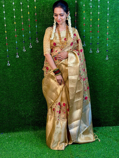 Golden tissue saree.