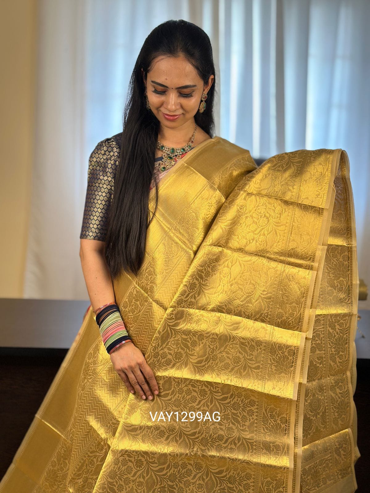 Golden tissue saree.YYY