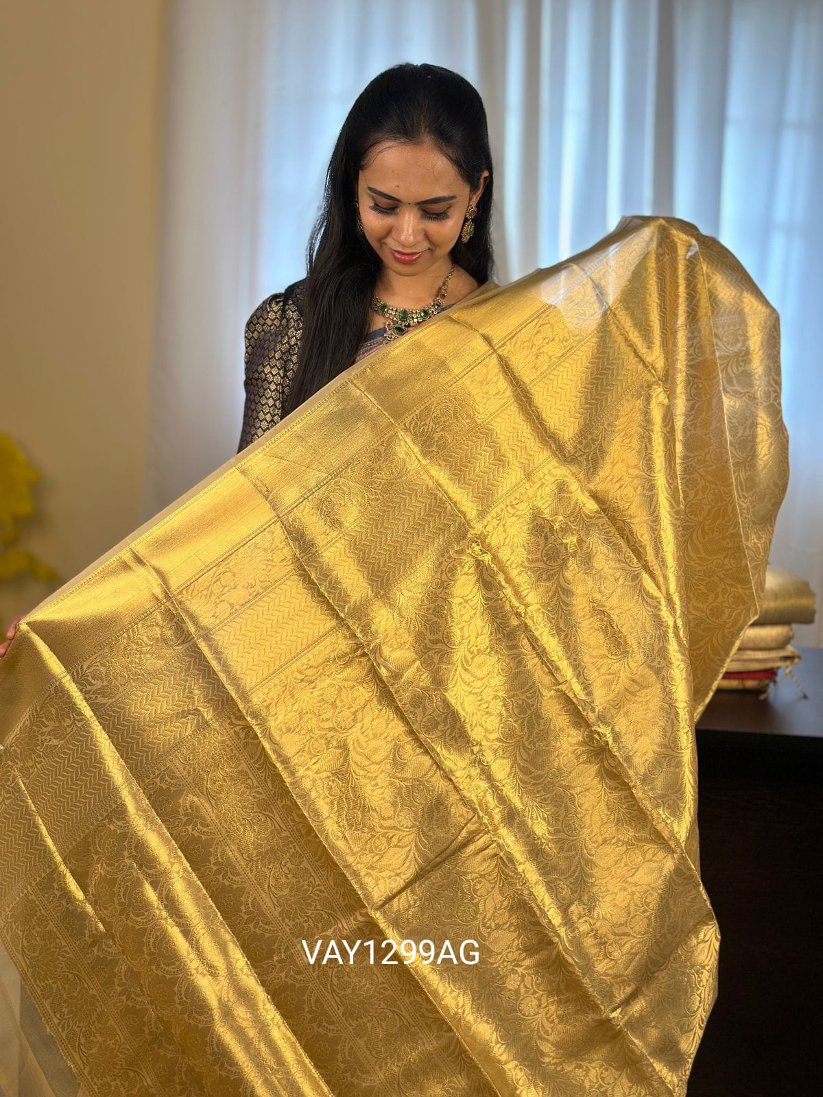 Golden tissue saree.YYY