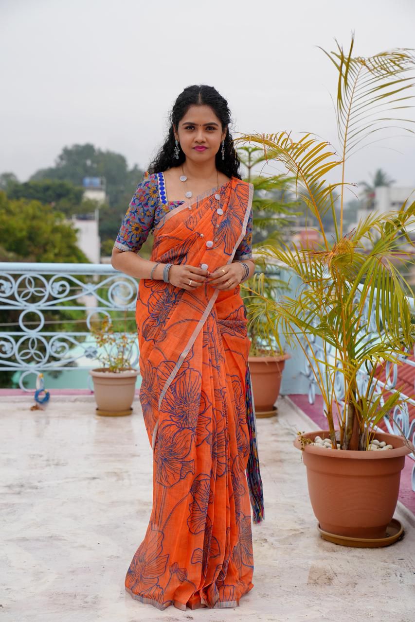 Printed semi cotton peach colour saree with line design. Same blouse as in picture🥳