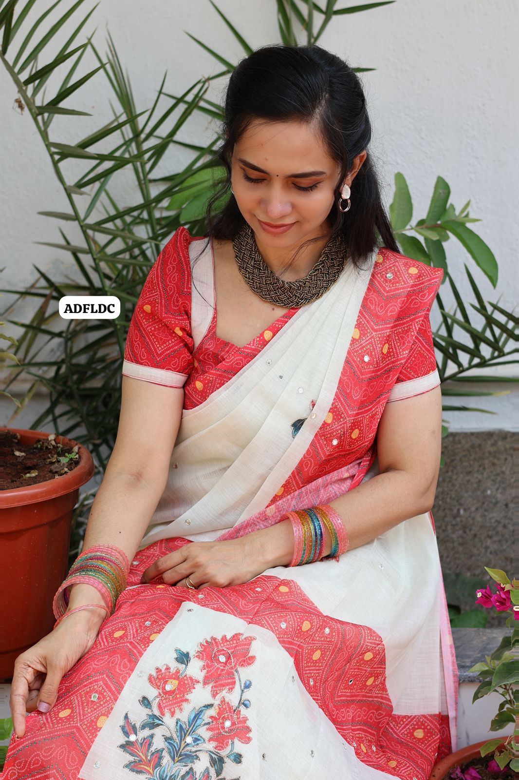 Linen cotton saree with floral designs mirror work and thread embroidery work  Colourful blouse🎁(unstitched blouse )