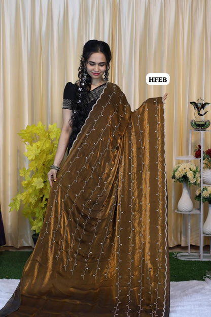 Premium space silk saree with real stone work . Perfect for reception function🥰🌈🥳