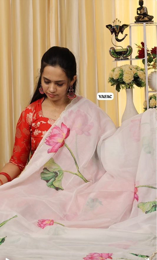 Soft organza with floral design and cut work scallop border along with handwork and pearl work🎁